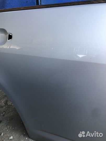 Задняя правая дверь Nissan Tiida 1