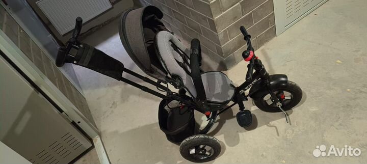 Трехколесный велосипед с ручкой