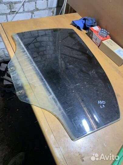 Стекло двери заднее левое Chevrolet Aveo T250