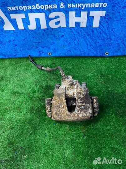 Суппорт тормозной передний правый Mazda 3 BK Z6