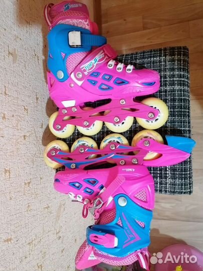 Роликовые коньки