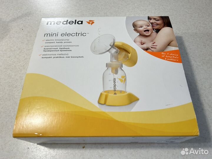 Молокоотсос medela + бутылочка со смарт соской