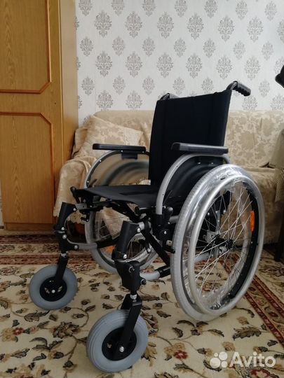 Инвалидная коляска новая