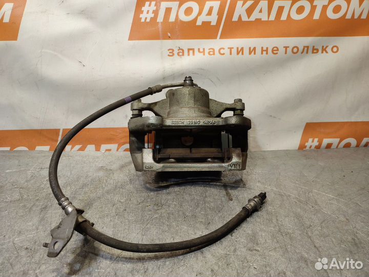 Суппорт тормозной передний левый Kia Sportage 5