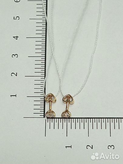 Золотые серьги с камнем