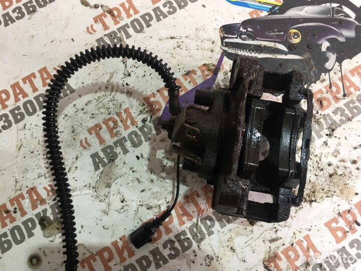 Фольксваген Туарег Суппорт задний Лев