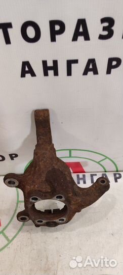 Цапфа передняя левая Nissan Juke F15E HR16DE 2012