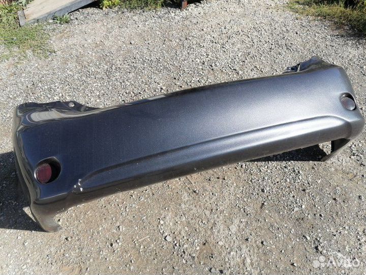 Бампер задний Toyota Corolla E150