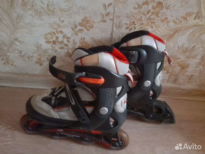 Роликовые коньки