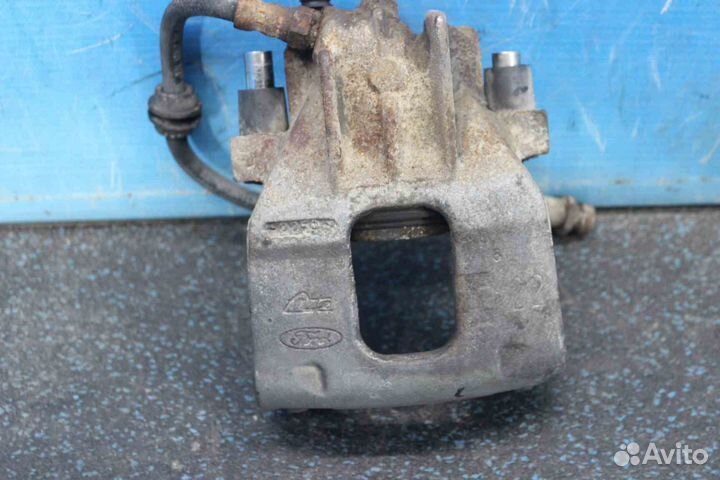 Суппорт Ford Focus I (Форд Фокус 1) DFW YS4Z2B120B