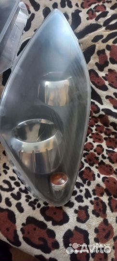 Стекло фары левое опель зафира б