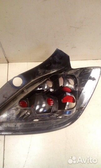 Фонарь левый Opel Astra