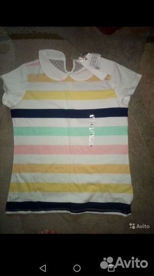 Много летних вещей с этикетками. Качественные