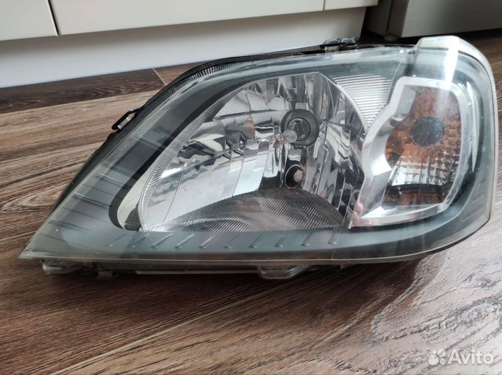 Фара передняя левая reno