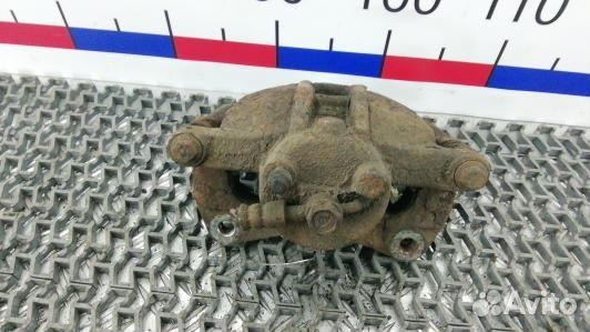 Суппорт тормозной передний правый toyota corolla E