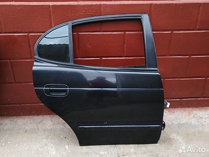 Дверь задния правая Део Леганза