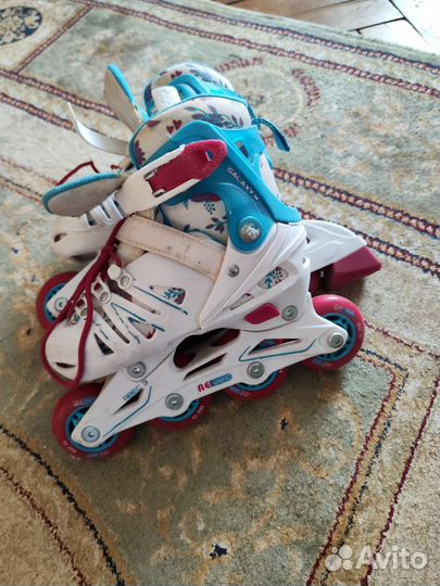 Роликовые коньки