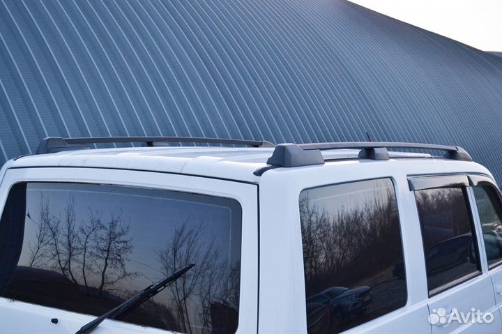 Рейлинги УАЗ Патриот на водосток (без сверления)