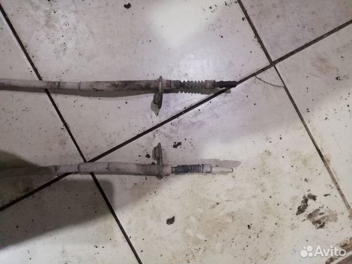 Трос стояночного тормоза Nissan Primera P12