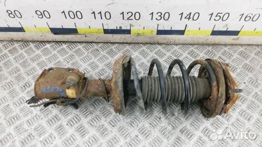 Стойка передняя левая mazda 323 BJ (8SE20K501)