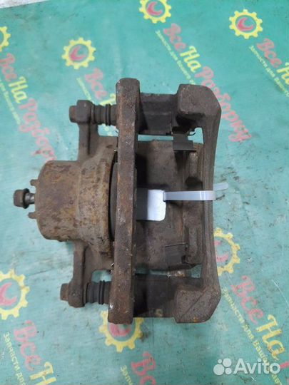 Суппорт передний левый Suzuki Sx4 хечбэк 1586см3