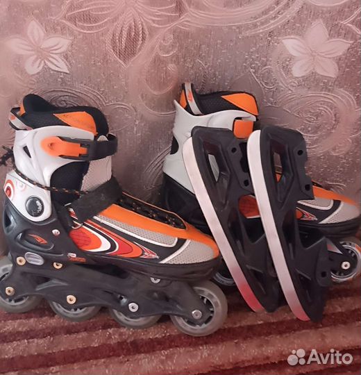 Роликовые коньки