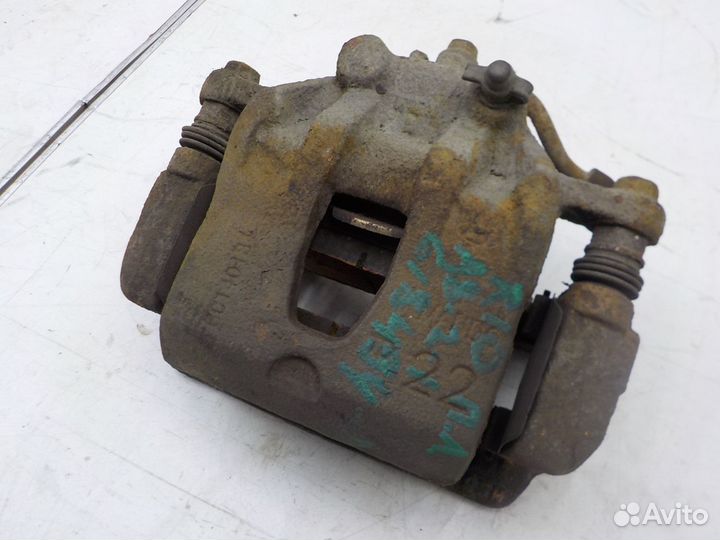 Суппорт тормозной передний левый на Kia Rio