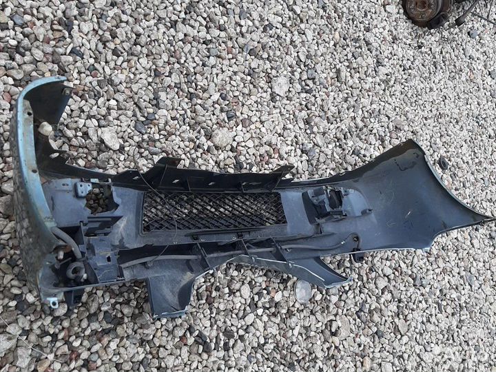 Бампер передний Мазда Примаси CP 2001-2004