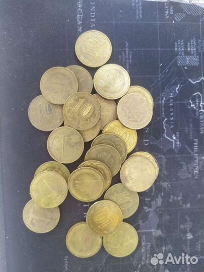 Монеты 50 лет первого полёта в космос