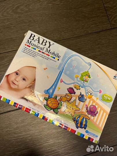 Мобиль новый