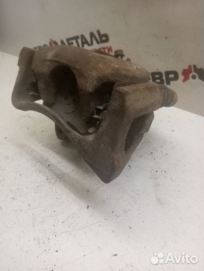 Суппорт тормозной задний правый Volkswagen Passat