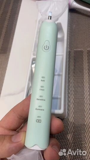 Электрическая звуковая зубная щетка