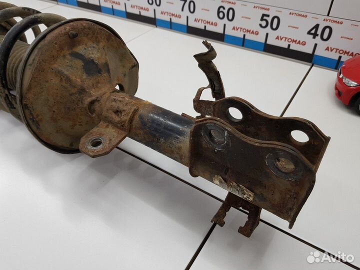 Амортизатор передний правый с пружиной