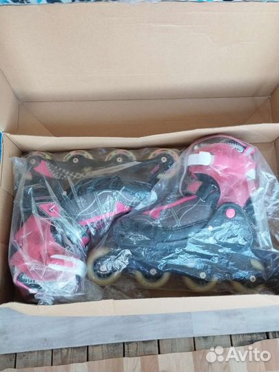 Роликовые коньки