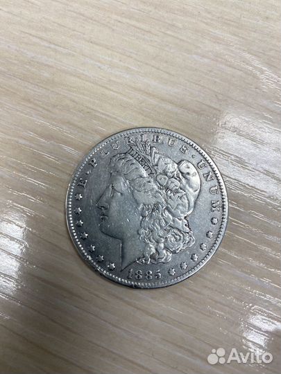 Серебряная монета (морганский доллар)