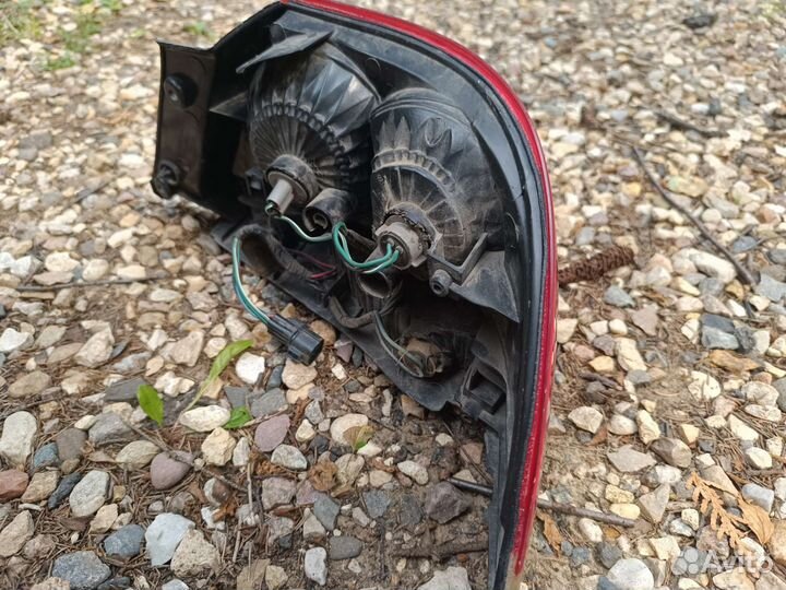 Фонарь задний левый lancer 9