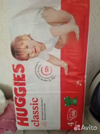 Памперсы детские 4