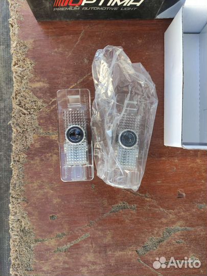 Подсветка дверей с логотипом бмв