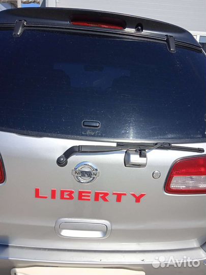 Продам (шильжик) буквы на 5 дверь Nissan Liberty