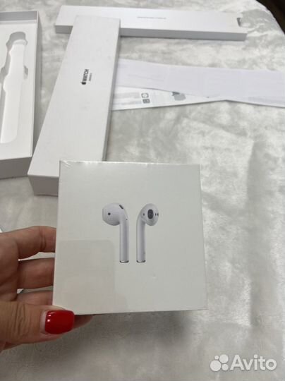 Беспроводные наушники apple airpods новые