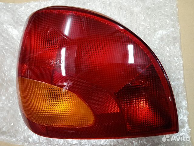 Новый, ориг. Задний фонарь 1044156 Ford Fiesta