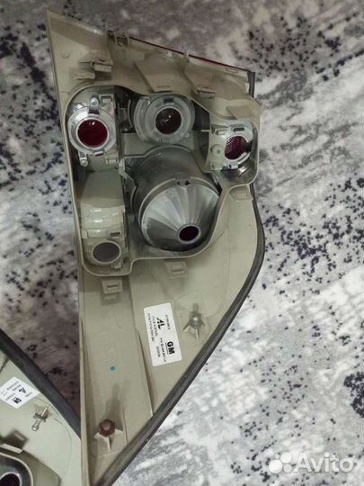 Задний фонарь opel astra h седан