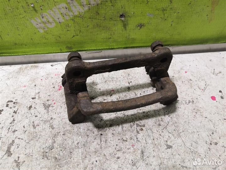 Скоба суппорта заднего Тойота Королла Е120