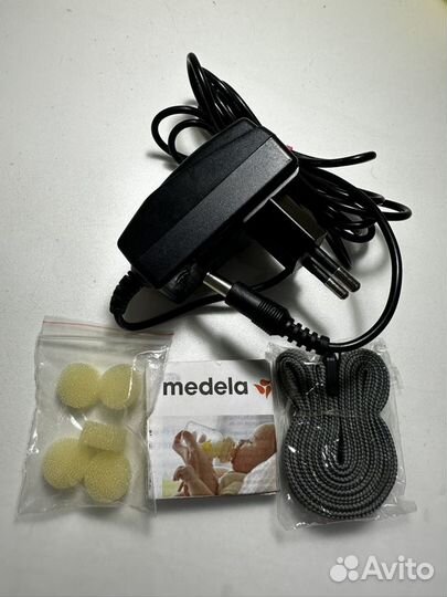 Молокоотсос medela swing