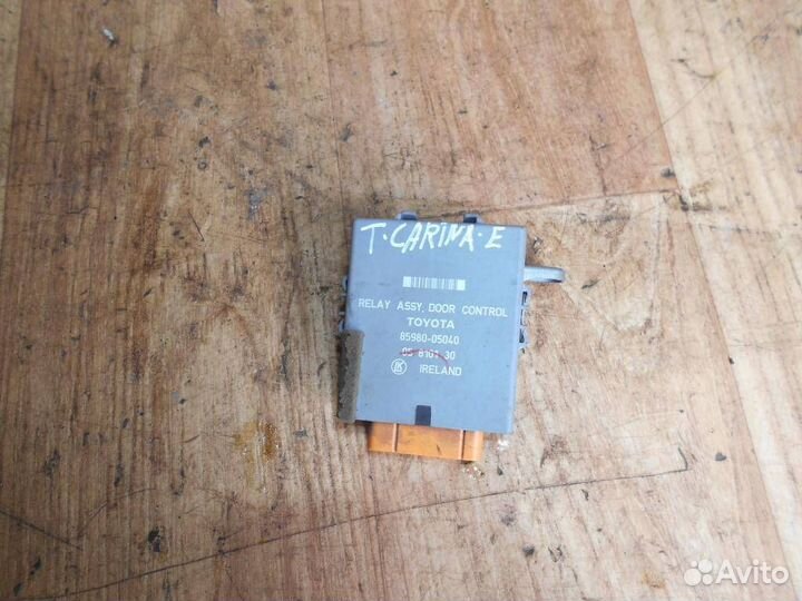 Блок управления дверьми Toyota Carina E 1992-1997