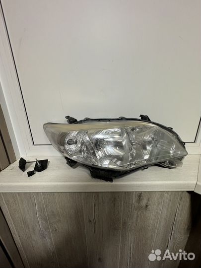 Фара левая для toyota corolla 150