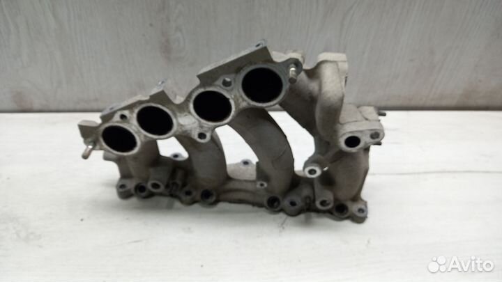 Коллектор впускной Mazda 323 BA