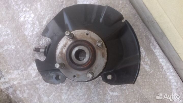 Киа Рио 2 левый поворотный кулак