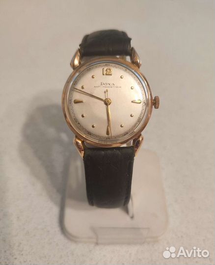 Золотые часы Doxa