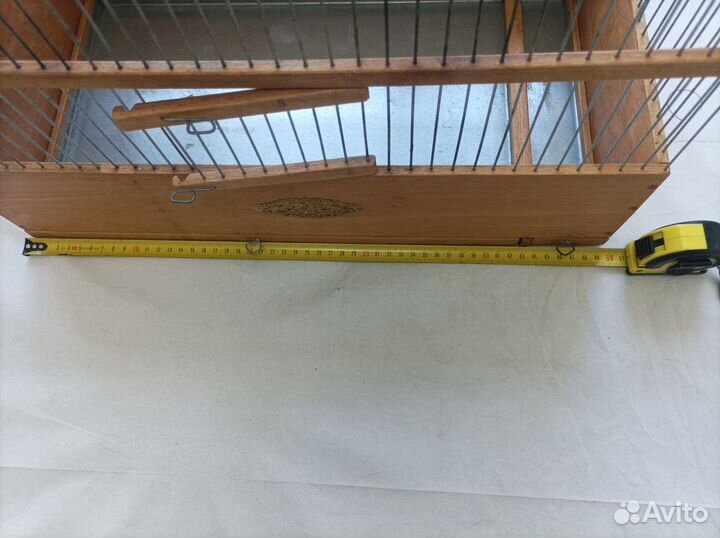 Деревянная клетка для птиц